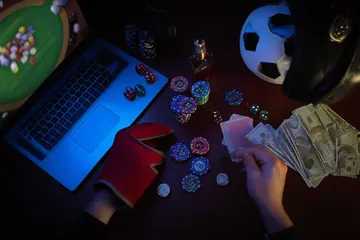 A cheerful woman in traditional clothing using her smartphone during a festive moment, showing how easily the KRIKYY app fits into everyday life.