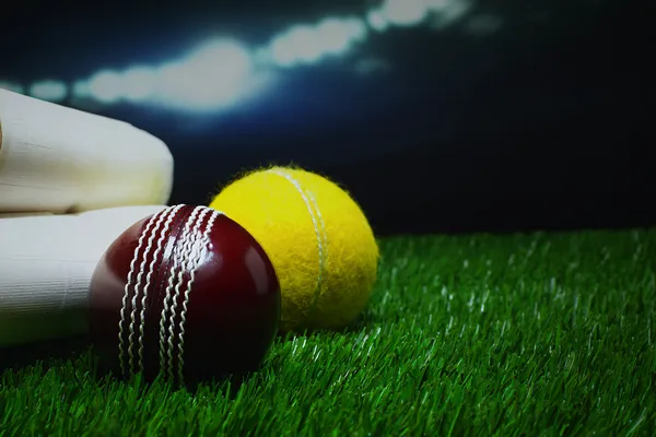 A woman in a luxurious green gown next to an ornate roulette wheel, capturing the upscale casino mood of KRIKYY.