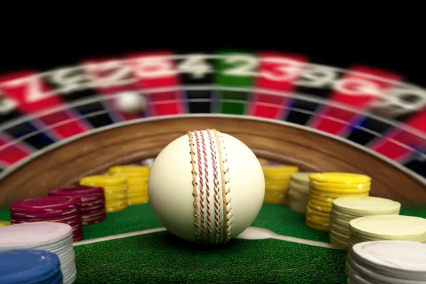 A player using their smartphone during a festive local event, representing KRIKYY’s fully mobile-friendly casino.